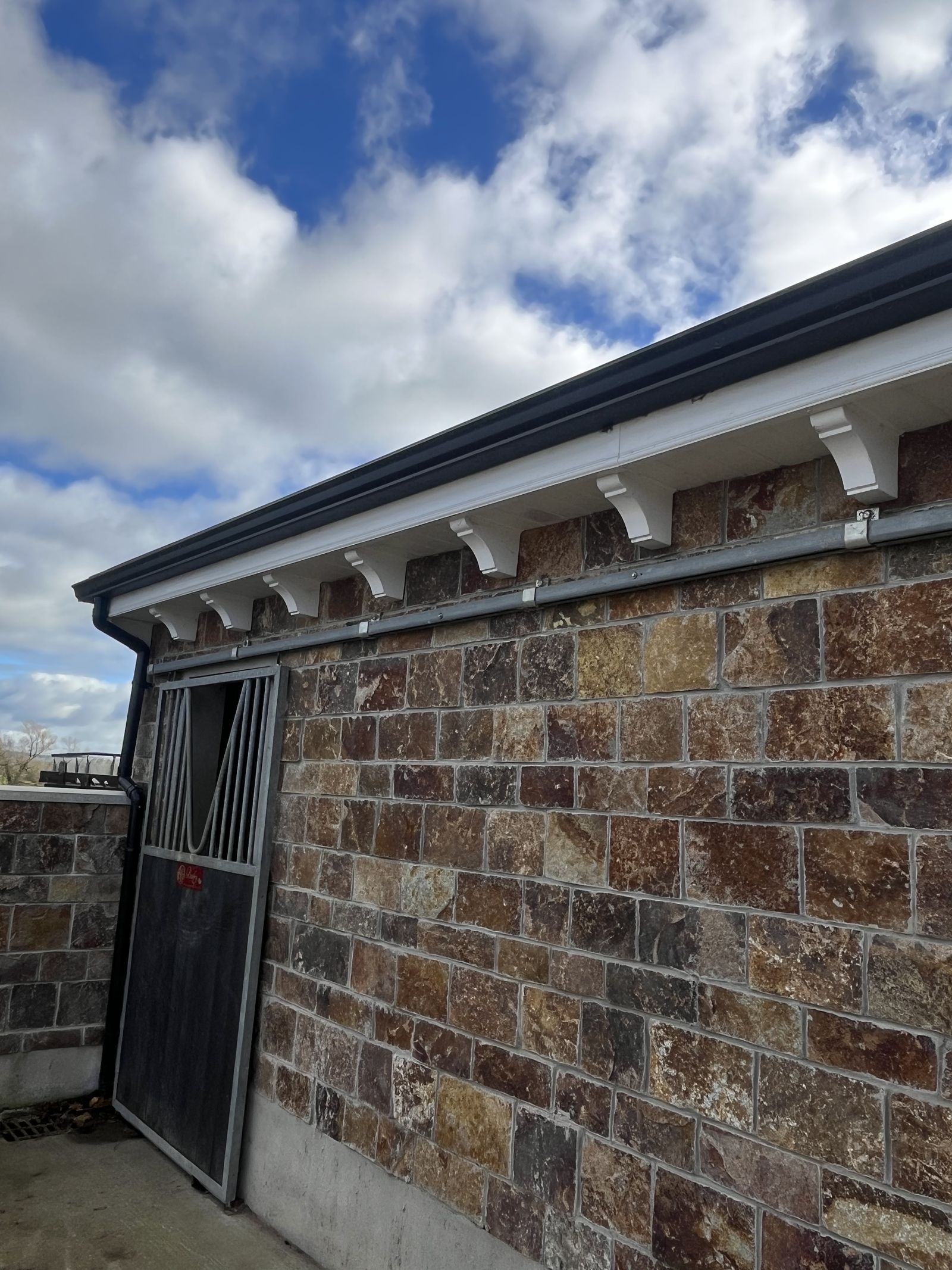 Seamless guttering, stable block