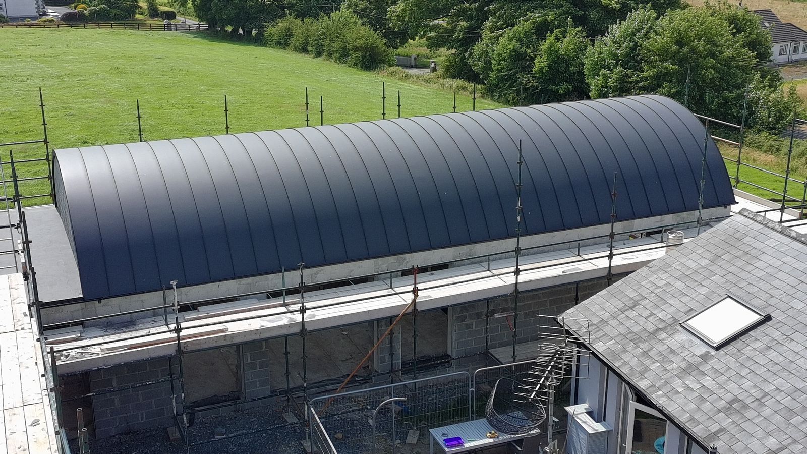 Curved barrel zinc roof