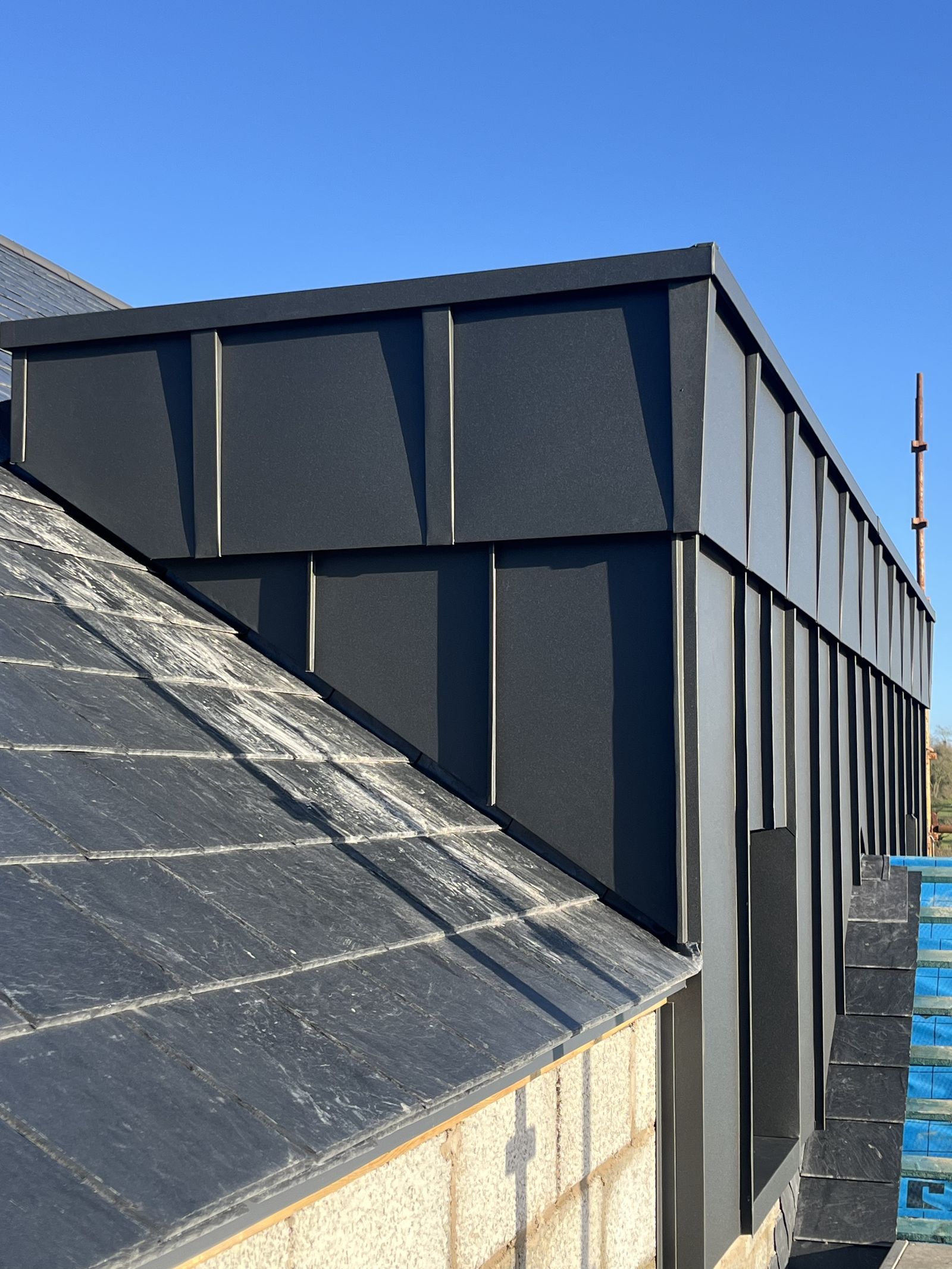 Standing seam clad dormer